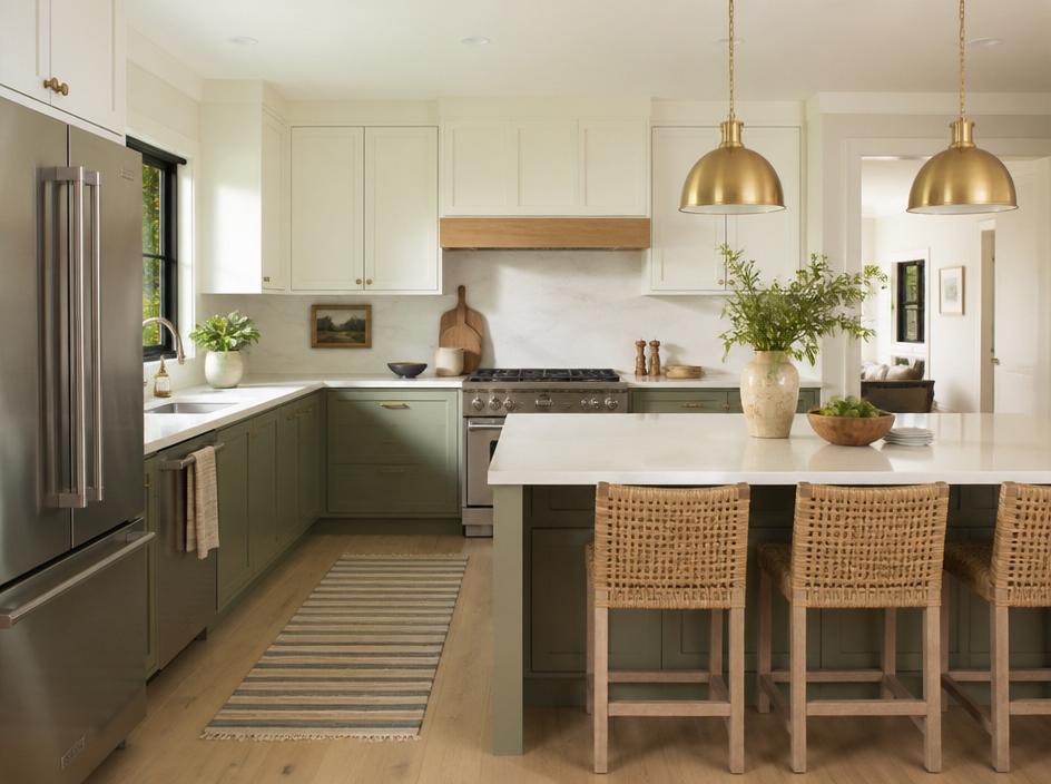 Bright modern kitchen with sage green cabinets and quartz countertops